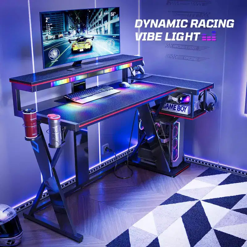 Scrivania da gaming a L con luce LED, supporto per monitor e presa di corrente – Nero/Viola, 42"/57", 1 persona