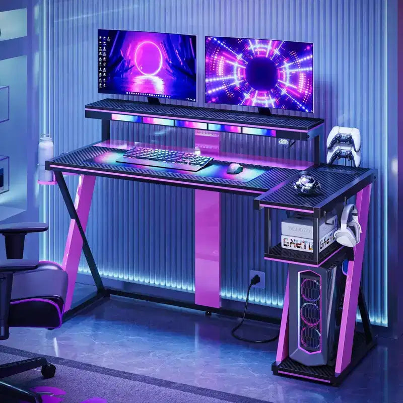 Scrivania da gaming a L con luce LED, supporto per monitor e presa di corrente – Nero/Viola, 42"/57", 1 persona