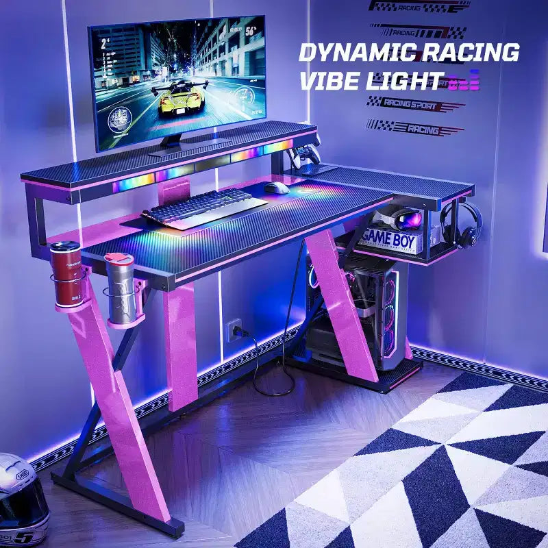 Scrivania da gaming a L con luce LED, supporto per monitor e presa di corrente – Nero/Viola, 42"/57", 1 persona